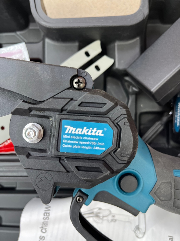 Цепная пила Makita 1